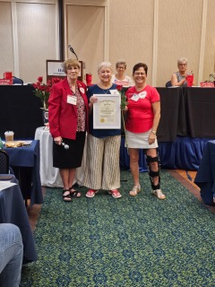 Phi Beta Psi Beta Sigma members together at a chapter event.